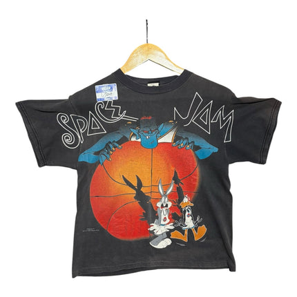 OutOf10 vintage black cotton Space Jam t-shirt with vibrant Tune Squad graphic print on a wooden hanger