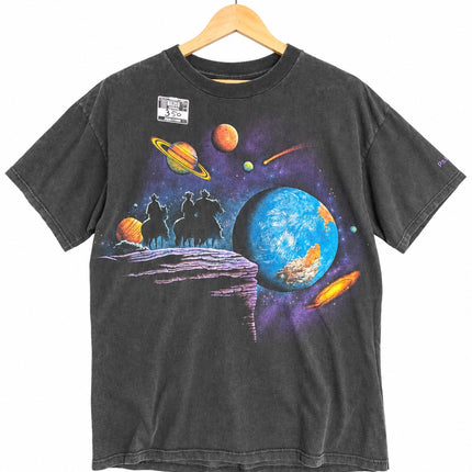 OutOf10 vintage washed-black cotton t-shirt featuring a space-western graphic of cowboys and planets on a hanger.