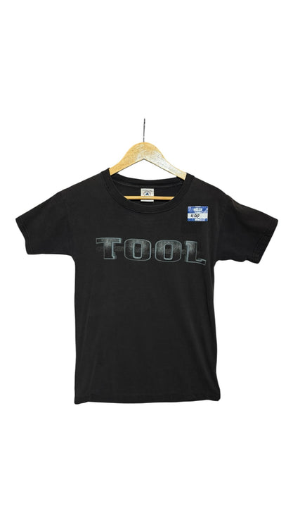 OutOf10 black vintage Tool band graphic t-shirt with a distressed metallic logo on the front, hanging on a hanger.