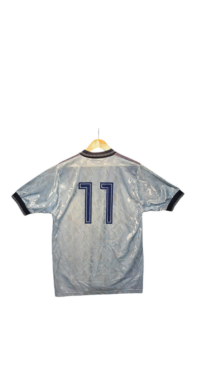 OutOf10 vintage light blue Umbro soccer jersey with geometric jacquard pattern and number 11 on the back