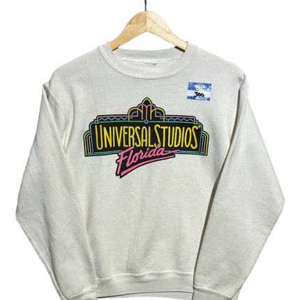 OutOf10 vintage off-white crewneck sweatshirt featuring a colourful 90s Universal Studios Florida neon graphic print.