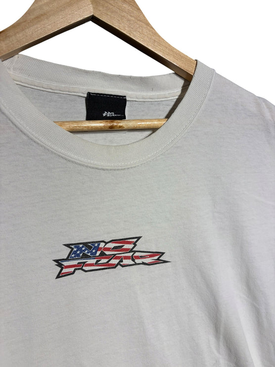 OutOf10 white cotton crewneck t-shirt featuring a vintage No Fear logo with an American flag graphic on the chest.