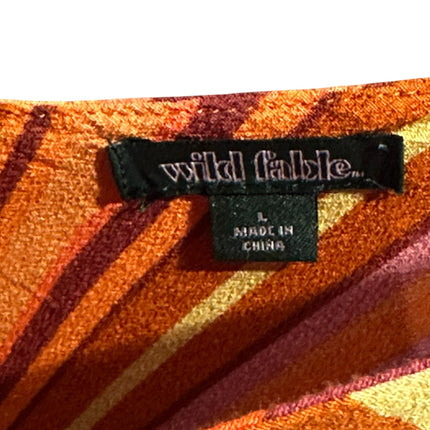 OutOf10 Wild Fable sleeveless mini dress label showing size L and sunset orange, pink, and yellow striped fabric