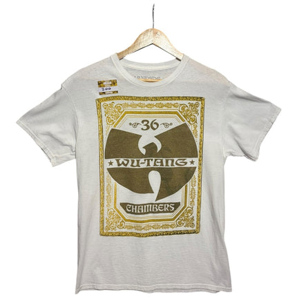 OutOf10 white cotton crewneck t-shirt featuring a gold Wu-Tang Clan 36 Chambers graphic print on a wooden hanger.