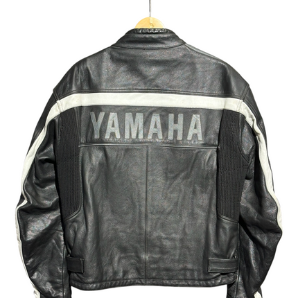 Back view of OutOf10 Yamaha black leather motorcycle jacket with white contrast stripes and bold Yamaha logo.