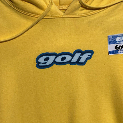 OutOf10 vibrant yellow GOLF Wang pullover hoodie with a blue embroidered chest logo and drawstring hood.