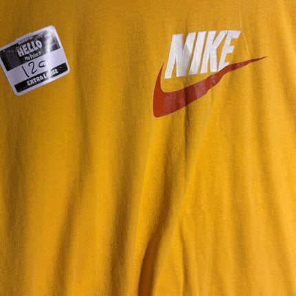 OutOf10 yellow Nike crew neck t-shirt with a prominent white and red logo graphic on the chest.