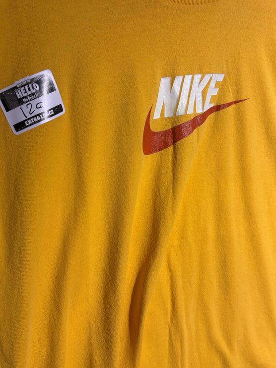 OutOf10 yellow Nike crew neck t-shirt with a prominent white and red logo graphic on the chest.