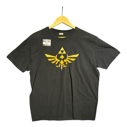 OutOf10 black crewneck t-shirt featuring a gold Legend of Zelda Hylian Crest and Triforce graphic print.